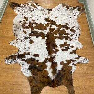Brown and White Cowhide Rug